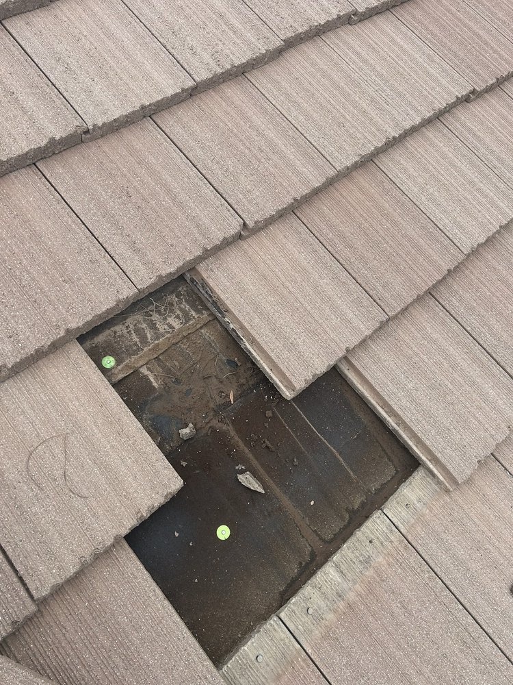 Slide of Alexander’s Roofing