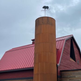 Musk Ox Farm - a red barn with a red roof - CSA Near Me - Palmer, Alaska