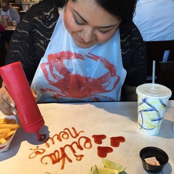 The Crab Bucket - Having fun with the ketchup - Cajun/Creole Near Me - Salinas, California