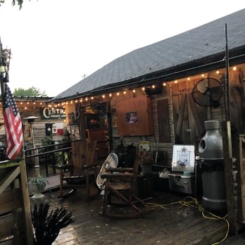 Shady Acres Saloon - a patio area with a grill, grilling area, and american flag - Venues & Event Spaces Near Me - Houston, Texas Shady Acres Saloon - a patio area with a grill, grilling area, and american flag - Venues & Event Spaces Near Me - Houston, Texas