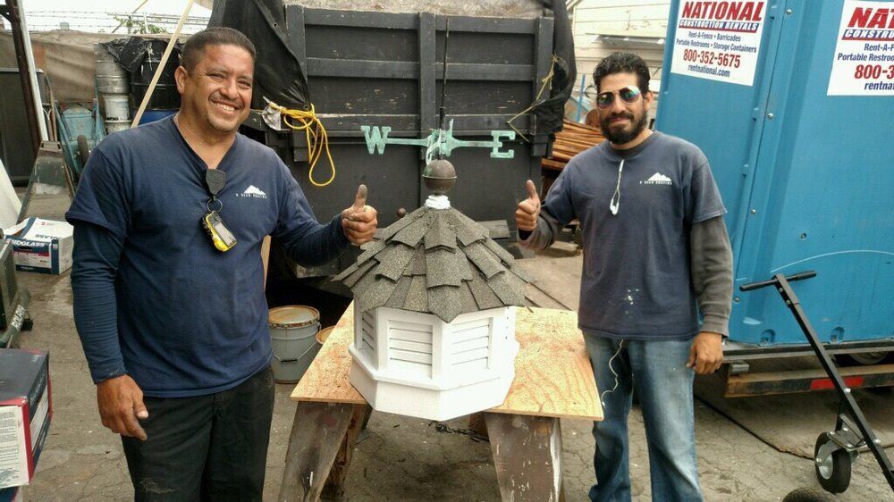 Slide of K Reed Roofing