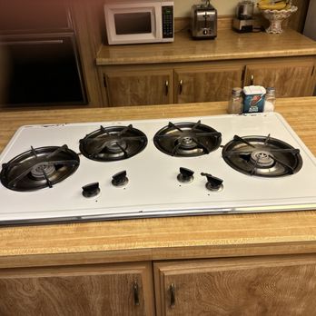 ProRock Construction - a stove top with four burners - Painters Near Me - Cupertino, California