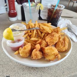 Fried jumbo shrimp with peach Cole slaw and fries