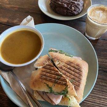 Cranked Espresso Bar - Turkey and Brie panini comes with small daily soup $14 - Coffee & Tea Near Me - Whistler, British Columbia Cranked Espresso Bar - Turkey and Brie panini comes with small daily soup $14 - Coffee & Tea Near Me - Whistler, British Columbia
