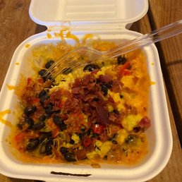 a takeout container of breakfast casserole a takeout container of breakfast casserole