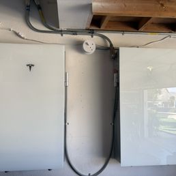 2 Tesla Batteries installed in garage. 2 Tesla Batteries installed in garage.