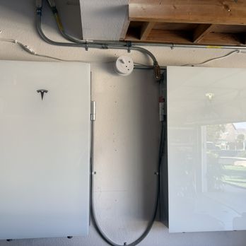 SolarTech - 2 Tesla Batteries installed in garage. - Solar Installation Near Me - El Cajon, California SolarTech - 2 Tesla Batteries installed in garage. - Solar Installation Near Me - El Cajon, California