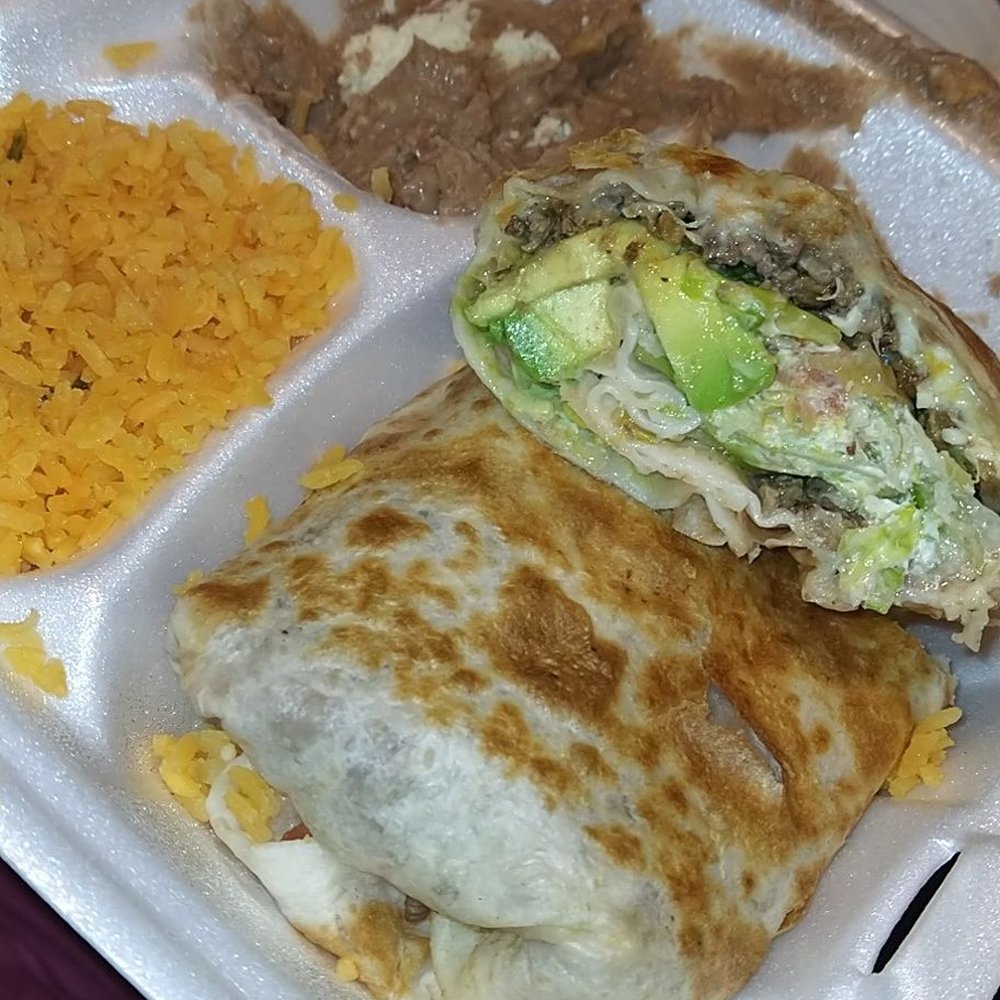 Taco Pros - Oak Park - Steak burrito inside - Tacos Near Me - Oak Park, Illinois Taco Pros - Oak Park - Steak burrito inside - Tacos Near Me - Oak Park, Illinois