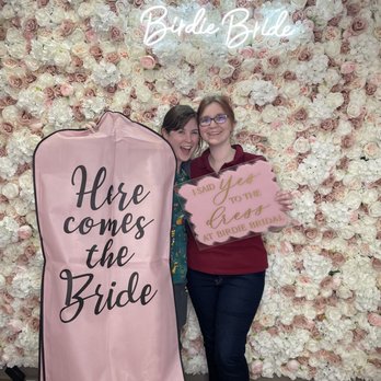 Birdie Bridal - Me ( red shirt ) and my bridesmaid in front of the flower wall - Bridal Near Me - Fort Worth, Texas
