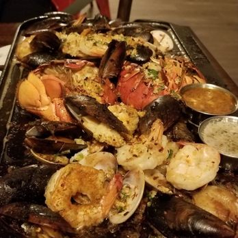 Pier 402 - The garlic roasted iron skillet. - Seafood Near Me - San Jose, California Pier 402 - The garlic roasted iron skillet. - Seafood Near Me - San Jose, California