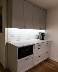 Quick kitchen face lift - Customer wanted a new kitchen but didn’t want to spend arm and a leg so we recommended replacing the hardware and giving it a fresh coat of paint