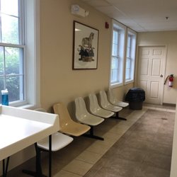 Stowe Laundry - A shelf mounted on this wall with regular chairs would provide a place for patrons to work on laptops while waiting for their laundry.