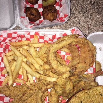 Louisiana Fish House - 2 Catfish 3 Shrimp. With fries and onion rings. Side of hushpuppies. - Cajun/Creole Near Me - Houston, Texas Louisiana Fish House - 2 Catfish 3 Shrimp. With fries and onion rings. Side of hushpuppies. - Cajun/Creole Near Me - Houston, Texas