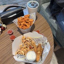 Potato Corner - Chili bbq curly fries with sour cream, onion fries, and chicken tenders. So so yummy!