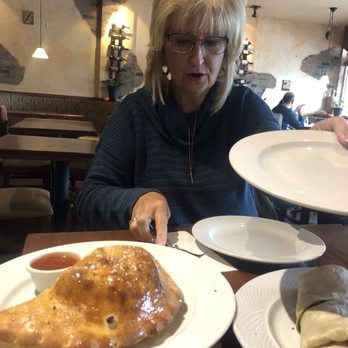 Raimo's Pizza - Over sized calzone. Yummy - Pizza Near Me - Hicksville, New York Raimo's Pizza - Over sized calzone. Yummy - Pizza Near Me - Hicksville, New York