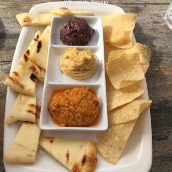 Union Social Eatery - Mediterranean platter appetizer w/ flat bread and warm chips. The olive and tomato dip was so flavourful! - Gastropubs Near Me - Toronto, Ontario