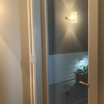 Apollo Screen & Shade - Retractable Screen door installed on the left frame of the doorway. - Shades & Blinds Near Me - Tukwila, Washington
