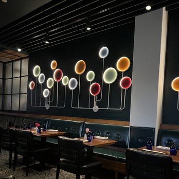 Hotel Indigo Madison Downtown - Dining room wall. - Hotels Near Me - Madison, Wisconsin Hotel Indigo Madison Downtown - Dining room wall. - Hotels Near Me - Madison, Wisconsin
