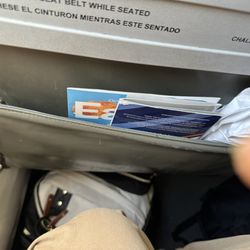 JetBlue - gum on the and trash in the back of the seat.
