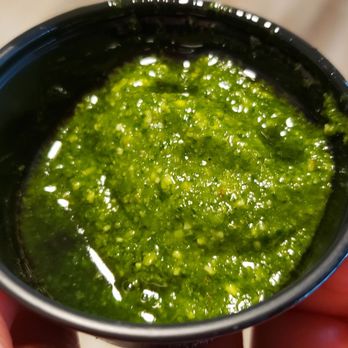 Floriana - Herbal garlic sauce that goes with the complimentary bread - Bars Near Me - Wilmington, North Carolina Floriana - Herbal garlic sauce that goes with the complimentary bread - Bars Near Me - Wilmington, North Carolina