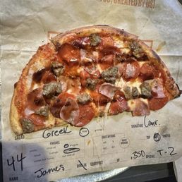 Carnivore Half 11-inch Pizza choice of side