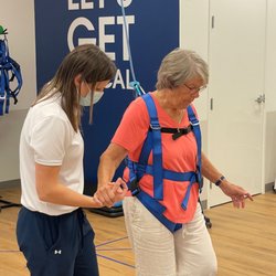 FYZICAL Therapy & Balance Centers - Round Rock - Dizziness and vertigo is often treatable. Dr. Tiffany providing therapy which includes an overhead harness to maximize safety and results!