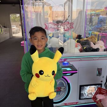 Dragon Claw - His first time winning a big one! - Arcades Near Me - Westminster, California Dragon Claw - His first time winning a big one! - Arcades Near Me - Westminster, California