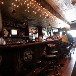 a man sitting at the bar