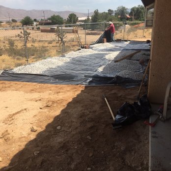 Oakes Landscape - Laying down the rock - Landscaping Near Me - Hesperia, California Oakes Landscape - Laying down the rock - Landscaping Near Me - Hesperia, California