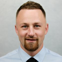 The Groomsmith - Meet The Groomsmith's team of barbers. Zach is a great conversationalist with traditional barbering skills.