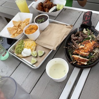 Eight Row Flint - Combination fajitas with queso - Gastropubs Near Me - Houston, Texas