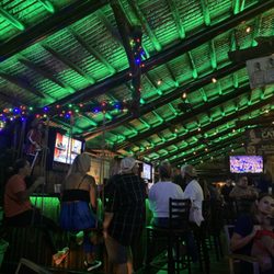 Green Iguana Bar & Grill - Outdoor bar and seating