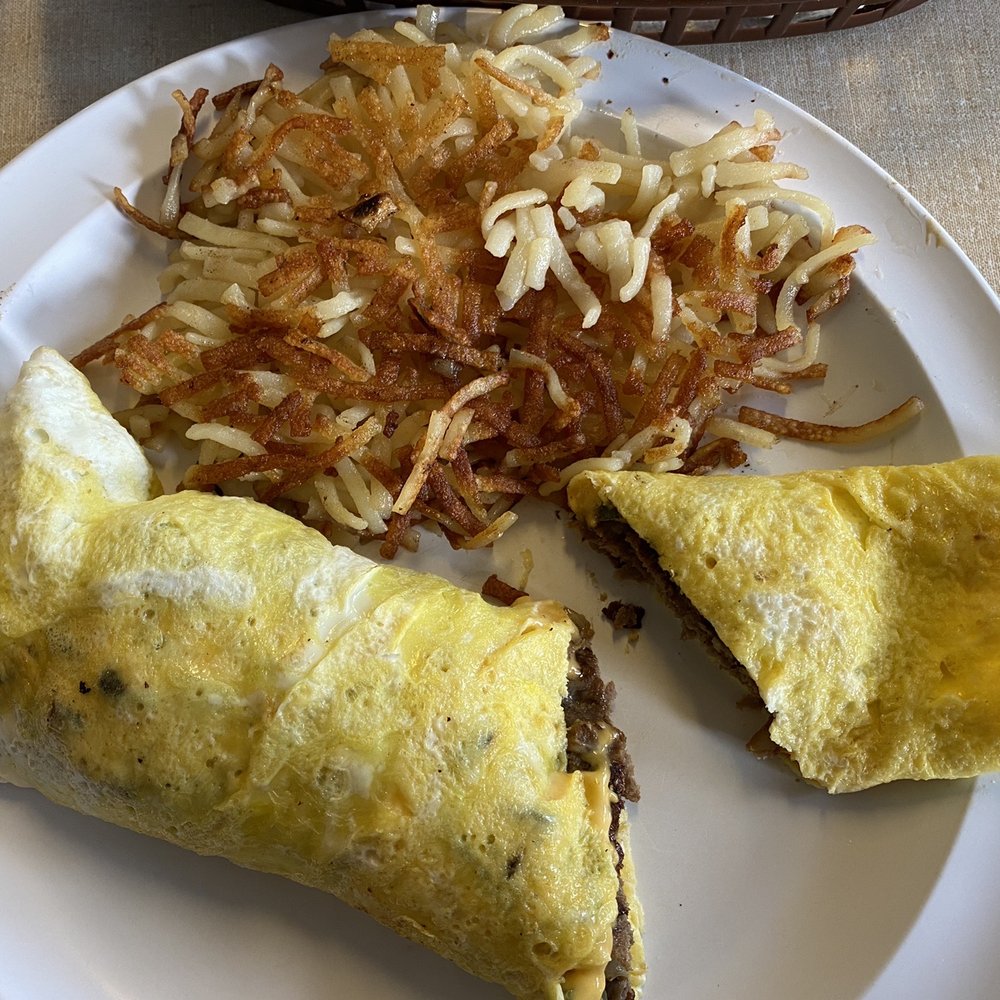The Coffee Shop - Philly cheesesteak omelette with hash browns. It might have 2 eggs but definitely not 3. - Coffee & Tea Near Me - Sylva, North Carolina The Coffee Shop - Philly cheesesteak omelette with hash browns. It might have 2 eggs but definitely not 3. - Coffee & Tea Near Me - Sylva, North Carolina