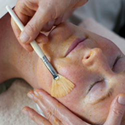 J Hendrickson Skin Care - Client receives a Pure Results facial, the ultimate in relaxation and results!