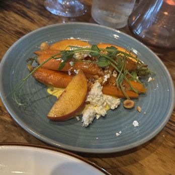 Earth at Hidden Pond - Roasted Carrots with aji amarillo, honey glaze, hazelnuts, peaches and feta (Delicious) - New American Near Me - Kennebunkport, Maine Earth at Hidden Pond - Roasted Carrots with aji amarillo, honey glaze, hazelnuts, peaches and feta (Delicious) - New American Near Me - Kennebunkport, Maine
