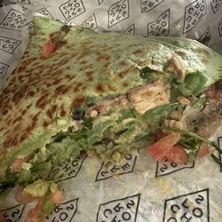 Surcheros - St. Simons - Chicken quesadilla with black beans pico and guacamole on spinach wrap
