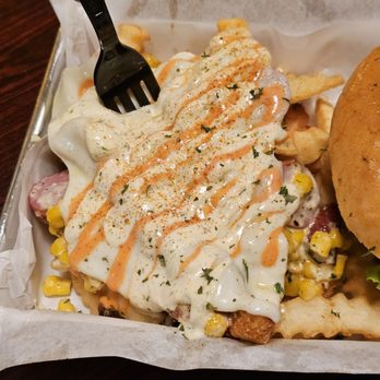 El Bumangues - Close up off the fries. Healthy portion of cheese on top. (Not sure which kind though) - Colombian Near Me - San Jose, California El Bumangues - Close up off the fries. Healthy portion of cheese on top. (Not sure which kind though) - Colombian Near Me - San Jose, California