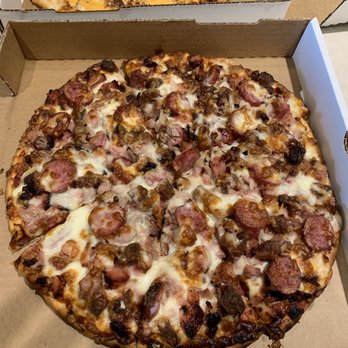 Kenjo's BBQ - Four meat pizza - brisket, ham, sausage, & chicken. This pizza is loaded with meat in ever delicious bite - Barbeque Near Me - Brazoria, Texas Kenjo's BBQ - Four meat pizza - brisket, ham, sausage, & chicken. This pizza is loaded with meat in ever delicious bite - Barbeque Near Me - Brazoria, Texas