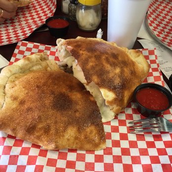 Sofia's Pizzeria - Regular calzone! I could only eat half. Fantastic dough and generous filling. - Pizza Near Me - San Antonio, Texas Sofia's Pizzeria - Regular calzone! I could only eat half. Fantastic dough and generous filling. - Pizza Near Me - San Antonio, Texas