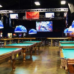 Shooter's Sports Bar & Grill - 9 Pool Tables with 13 LCD TVs and 2 Projection Screens at Shooters Sports Bar!