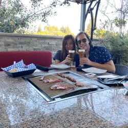 Mangal Turkish Grill - Expansive patio with outdoor personal grills at each table
