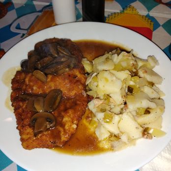 Deutsche Ecke - Schnitzel with mushroom gravy and potato salad. - Desserts Near Me - Newport News, Virginia Deutsche Ecke - Schnitzel with mushroom gravy and potato salad. - Desserts Near Me - Newport News, Virginia