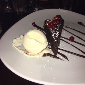 SoHo - Flourless Chocolate Cake with Vanilla Ice Cream - Bars Near Me - Cork, Colorado SoHo - Flourless Chocolate Cake with Vanilla Ice Cream - Bars Near Me - Cork, Colorado