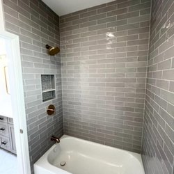Unique Remodel - Conversion to walk-in showers