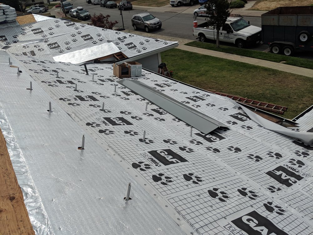 Slide of AMK Roofing