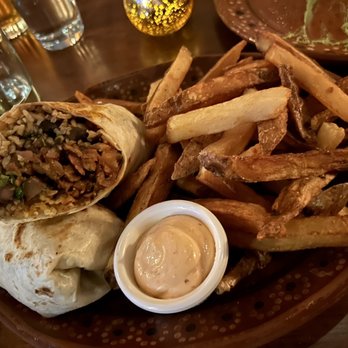 The Calaveras - Burrito (carnitas) with included side of fries - Bars Near Me - New York, New York The Calaveras - Burrito (carnitas) with included side of fries - Bars Near Me - New York, New York