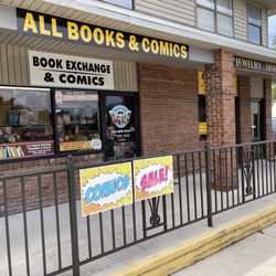 Jack’s Comics & More - The exterior of All Books & Comics, which is across from Target and next to Ray's Tire.