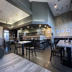 View of kitchen and restaurant seating