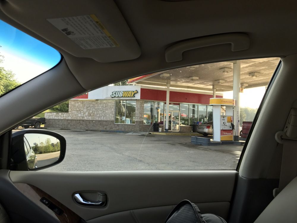 Heflin Shell Mart Logo