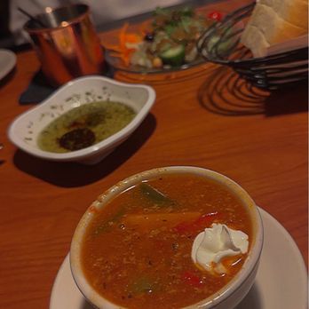 Santangelo's Restaurant - a bowl of soup on a plate - Italian Near Me - Liverpool, New York Santangelo's Restaurant - a bowl of soup on a plate - Italian Near Me - Liverpool, New York